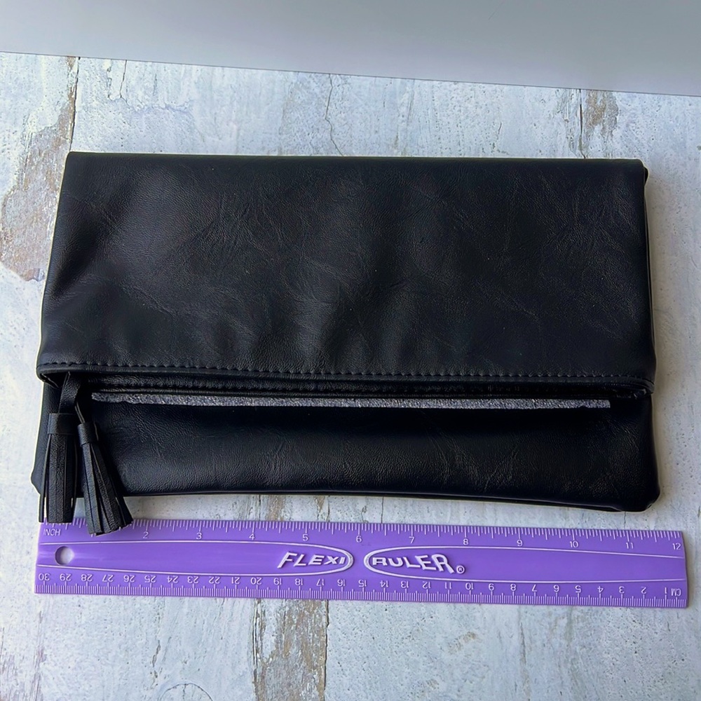 MONAT Black Clutch